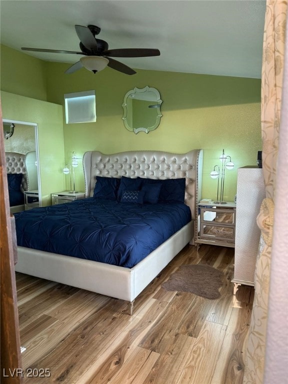 6248 Sapporo Cir, Las Vegas, NV 89110 - bedroom featuring wood finished floors and a ceiling fan