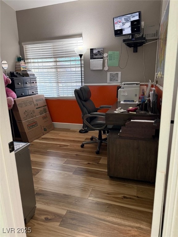 6248 Sapporo Cir, Las Vegas, NV 89110 - home office featuring wood finished floors and baseboards