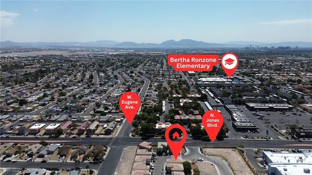 6117 Daisy Lee Ave, Las Vegas, NV 89108 - aerial view of property and surrounding area with a mountainous background