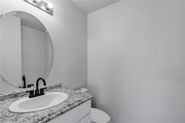 6117 Daisy Lee Ave, Las Vegas, NV 89108 - bathroom featuring vanity and toilet