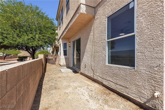 6117 Daisy Lee Ave, Las Vegas, NV 89108 - view of home's exterior with stucco siding