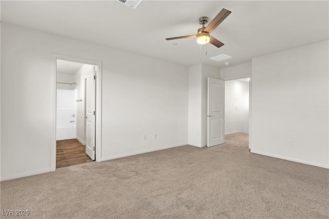 6952 Crescent Gold St, North Las Vegas, NV 89086 - empty room with carpet floors, a ceiling fan, and baseboards