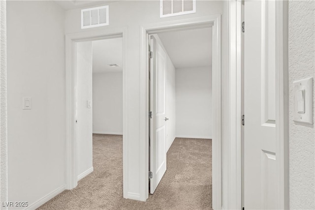 6952 Crescent Gold St, North Las Vegas, NV 89086 - hallway with light carpet and baseboards