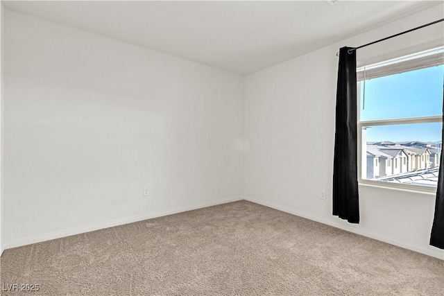 6952 Crescent Gold St, North Las Vegas, NV 89086 - empty room with light colored carpet and baseboards