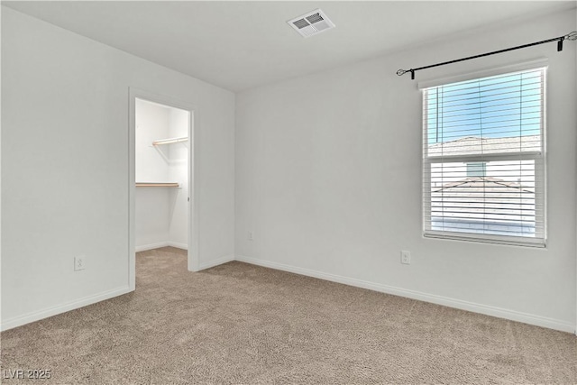 6952 Crescent Gold St, North Las Vegas, NV 89086 - spare room with light colored carpet and baseboards