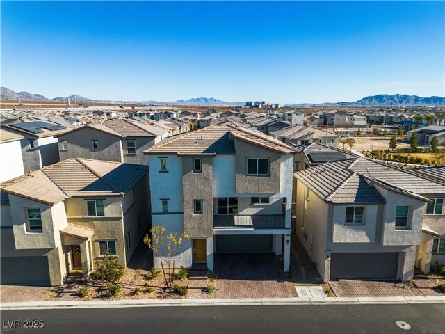 6952 Crescent Gold St, North Las Vegas, NV 89086 - view of front of home featuring a balcony, a residential view, and a mountain view