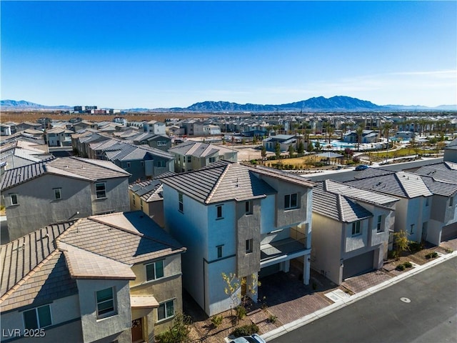 6952 Crescent Gold St, North Las Vegas, NV 89086 - aerial perspective of suburban area featuring a mountain backdrop