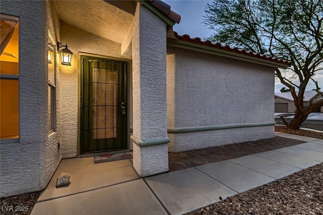 3426 Side Saddle Ct, North Las Vegas, NV 89032 - entrance to property featuring stucco siding and a tile roof
