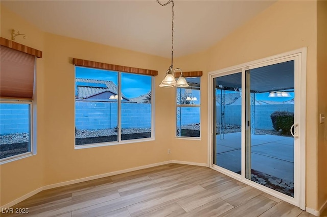 3426 Side Saddle Ct, North Las Vegas, NV 89032 - unfurnished dining area with light wood finished floors, healthy amount of natural light, and baseboards