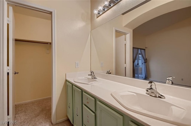 3426 Side Saddle Ct, North Las Vegas, NV 89032 - full bathroom featuring double vanity and baseboards