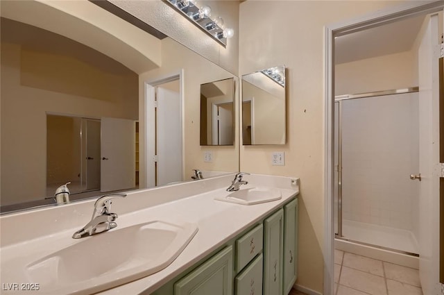 3426 Side Saddle Ct, North Las Vegas, NV 89032 - bathroom with a stall shower, double vanity, and tile patterned flooring