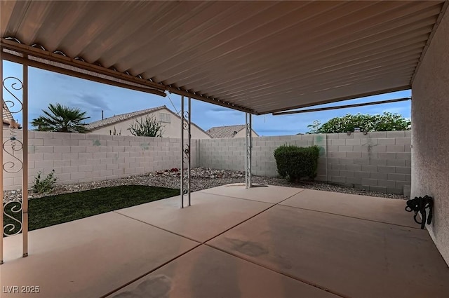 3426 Side Saddle Ct, North Las Vegas, NV 89032 - fenced backyard with a patio