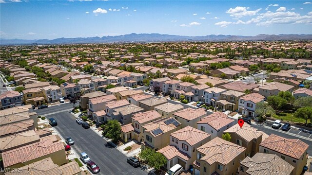 7694 Hampton Park Ln, Las Vegas, NV 89113 - aerial perspective of suburban area featuring a mountain backdrop