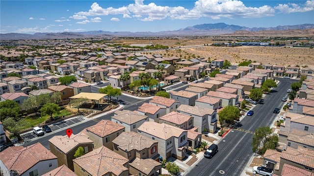 7694 Hampton Park Ln, Las Vegas, NV 89113 - aerial perspective of suburban area featuring mountains