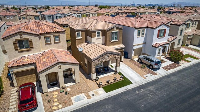 7694 Hampton Park Ln, Las Vegas, NV 89113 - view of front of property featuring a residential view, a tiled roof, and stucco siding
