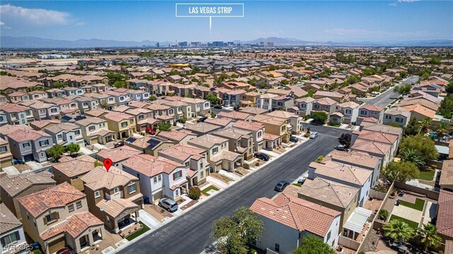 7694 Hampton Park Ln, Las Vegas, NV 89113 - aerial view of residential area with a mountain backdrop