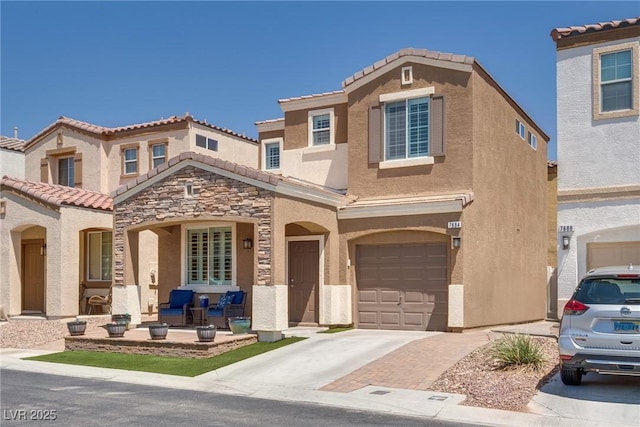 7694 Hampton Park Ln, Las Vegas, NV 89113 - view of front facade featuring stucco siding, concrete driveway, stone siding, an attached garage, and a tile roof