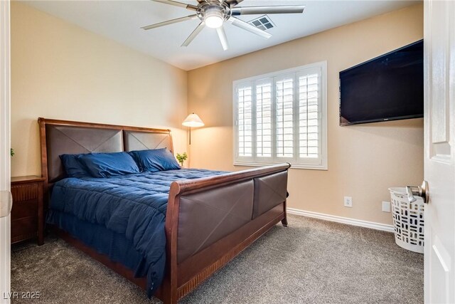 7694 Hampton Park Ln, Las Vegas, NV 89113 - carpeted bedroom with baseboards and a ceiling fan