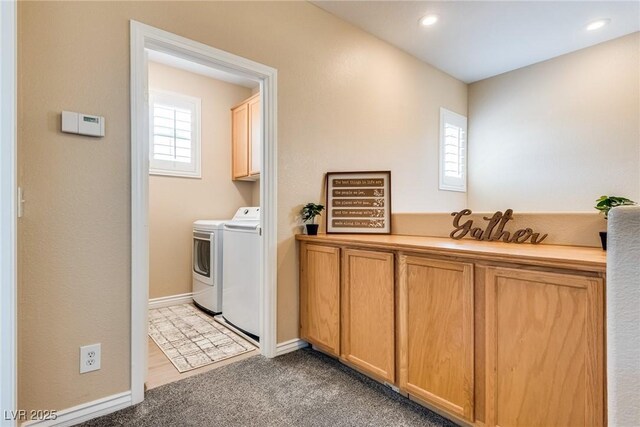 7694 Hampton Park Ln, Las Vegas, NV 89113 - laundry room with washing machine and dryer, plenty of natural light, cabinet space, carpet floors, and recessed lighting