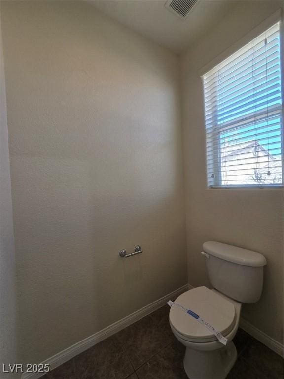 9312 Gold Dove Ct, Las Vegas, NV 89178 - bathroom with toilet, tile patterned floors, and baseboards