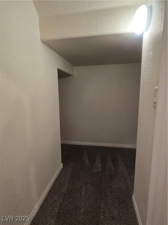 9312 Gold Dove Ct, Las Vegas, NV 89178 - hallway featuring carpet floors and baseboards