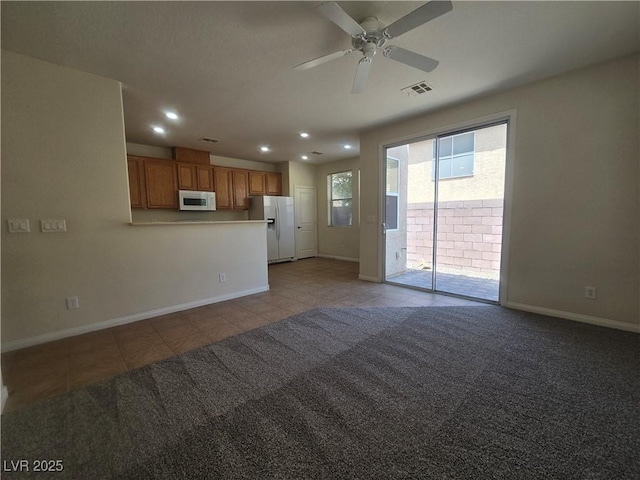 9312 Gold Dove Ct, Las Vegas, NV 89178 - unfurnished living room with recessed lighting, baseboards, light tile patterned floors, and ceiling fan