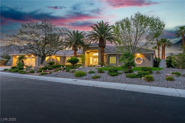 7738 Willow Cove Cir, Las Vegas, NV 89129 - view of front facade featuring a tiled roof and stucco siding