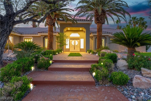 7738 Willow Cove Cir, Las Vegas, NV 89129 - view of front of house with stucco siding and a tiled roof