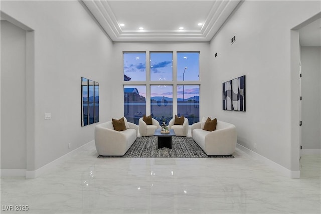 7738 Willow Cove Cir, Las Vegas, NV 89129 - living room featuring baseboards, marble finish floors, a tray ceiling, recessed lighting, and a high ceiling