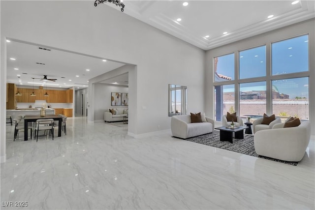 7738 Willow Cove Cir, Las Vegas, NV 89129 - living room featuring light marble finish flooring, a towering ceiling, baseboards, recessed lighting, and ceiling fan