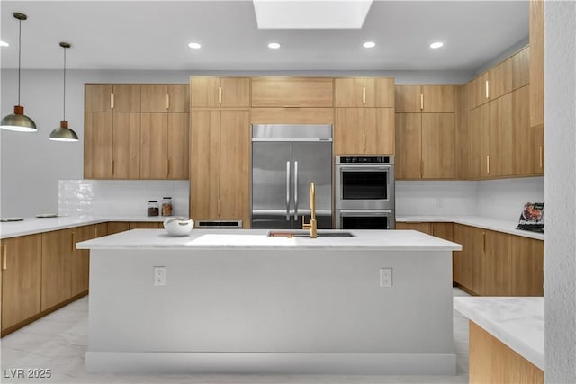 7738 Willow Cove Cir, Las Vegas, NV 89129 - kitchen featuring appliances with stainless steel finishes, modern cabinets, a sink, recessed lighting, and a kitchen island with sink