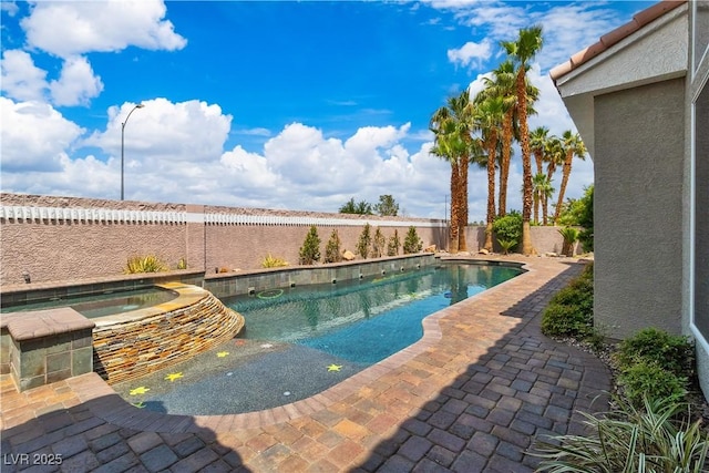 7738 Willow Cove Cir, Las Vegas, NV 89129 - view of swimming pool featuring a fenced backyard, a patio, and a pool with connected hot tub