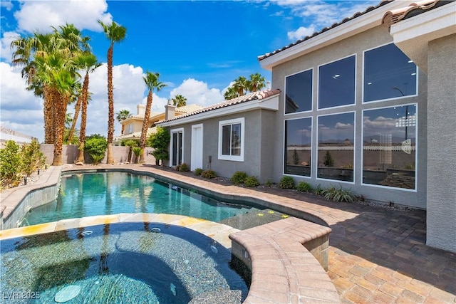 7738 Willow Cove Cir, Las Vegas, NV 89129 - view of swimming pool featuring a fenced backyard, a patio area, and a pool with connected hot tub