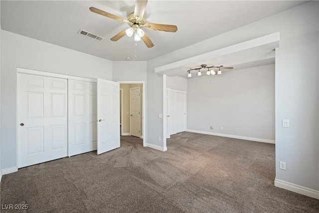 8541 Highland View Ave, Las Vegas, NV 89145 - unfurnished bedroom featuring carpet floors, baseboards, a closet, and ceiling fan