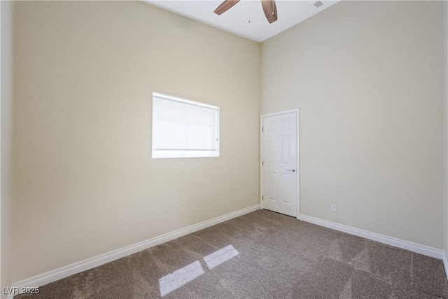 8541 Highland View Ave, Las Vegas, NV 89145 - carpeted spare room with a ceiling fan and baseboards