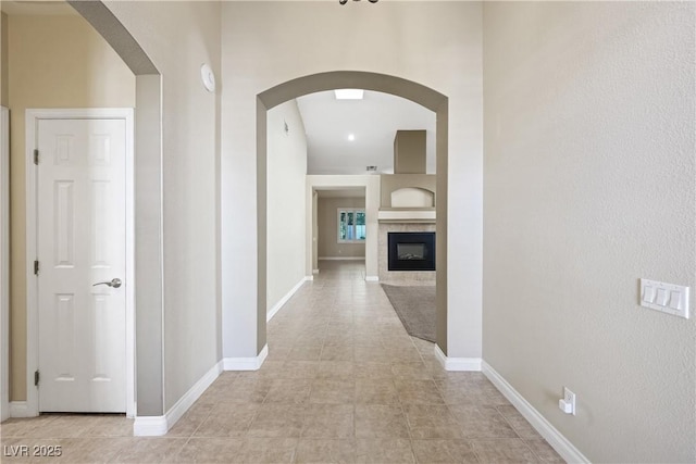8541 Highland View Ave, Las Vegas, NV 89145 - hall with arched walkways and baseboards