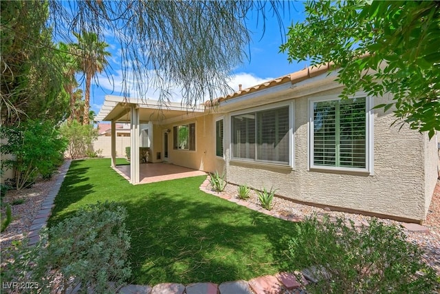 8541 Highland View Ave, Las Vegas, NV 89145 - rear view of property featuring stucco siding, a patio, and a tile roof