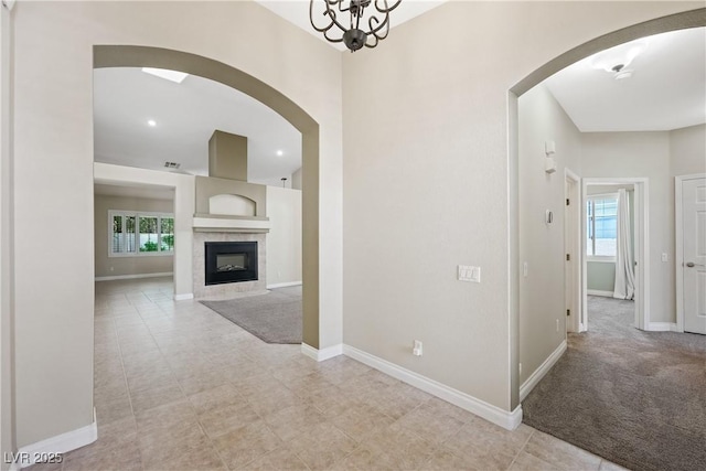 8541 Highland View Ave, Las Vegas, NV 89145 - hallway featuring arched walkways and baseboards