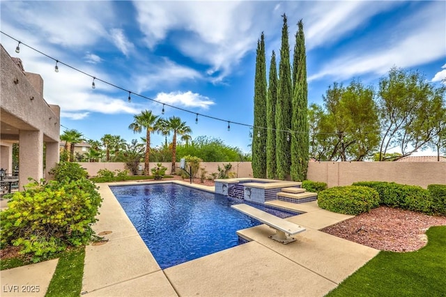 2982 Hammerwood Dr, Las Vegas, NV 89135 - view of swimming pool with an in-ground hot tub, a fenced backyard, and a patio area