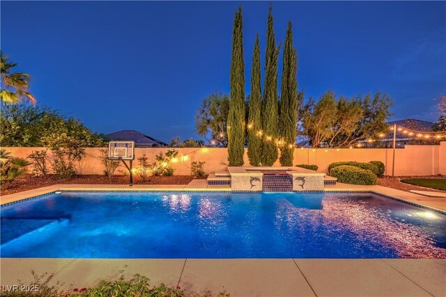 2982 Hammerwood Dr, Las Vegas, NV 89135 - pool at twilight with a fenced backyard and a patio