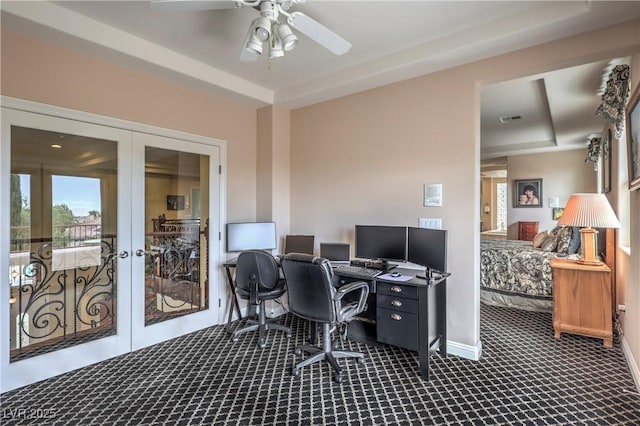 2982 Hammerwood Dr, Las Vegas, NV 89135 - office area with french doors, dark carpet, a ceiling fan, and baseboards