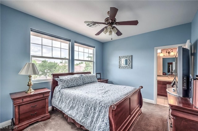 2982 Hammerwood Dr, Las Vegas, NV 89135 - bedroom with baseboards, dark colored carpet, multiple windows, and ceiling fan