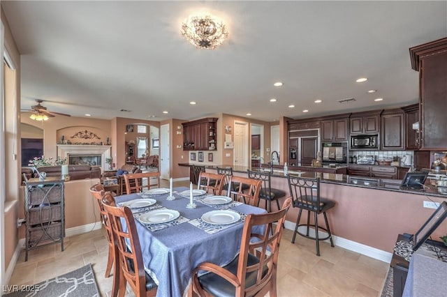 2982 Hammerwood Dr, Las Vegas, NV 89135 - dining space with ceiling fan, recessed lighting, and baseboards