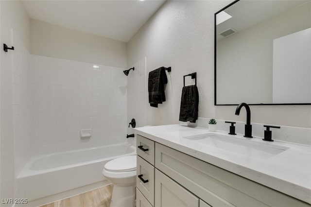 71 Sea Holly Way, Henderson, NV 89074 - full bathroom with vanity, toilet, shower / tub combination, and wood finished floors