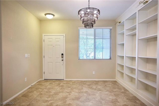 10449 Yew Blossom Ave, Las Vegas, NV 89166 - entrance foyer with a chandelier and baseboards