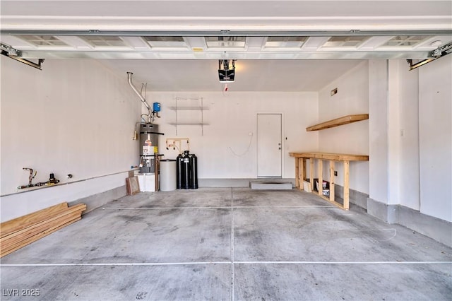 10449 Yew Blossom Ave, Las Vegas, NV 89166 - garage featuring strapped water heater and a garage door opener
