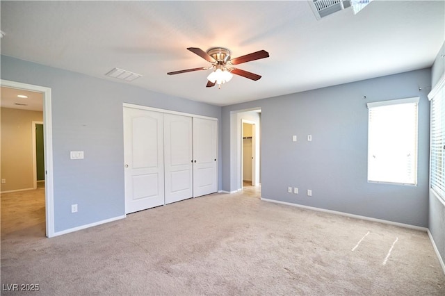 10449 Yew Blossom Ave, Las Vegas, NV 89166 - unfurnished bedroom featuring carpet flooring, a closet, baseboards, and ceiling fan