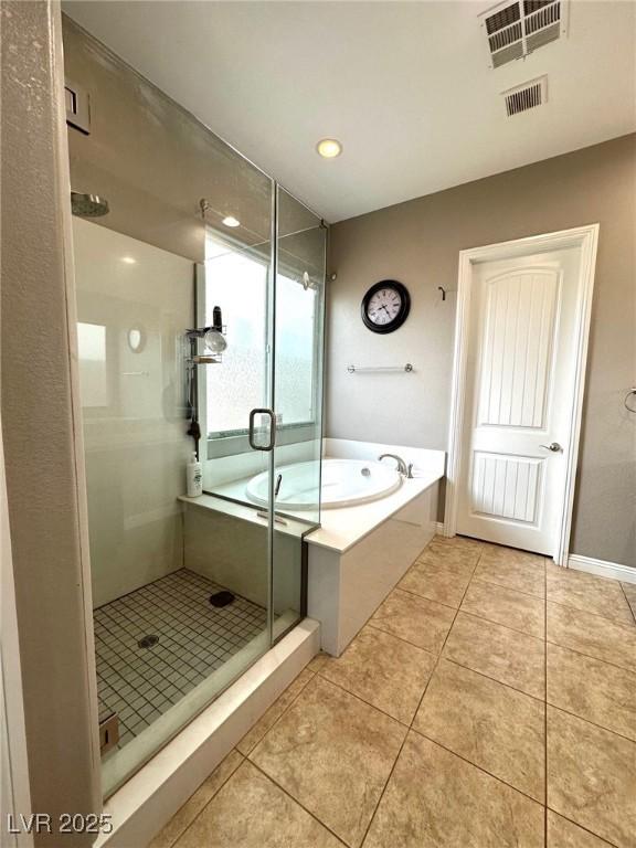 10719 Hammett Park Ave, Las Vegas, NV 89166 - full bathroom with a stall shower, a bath, tile patterned floors, and recessed lighting
