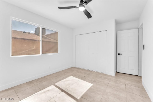 6717 Sheffield Dr, Las Vegas, NV 89108 - unfurnished bedroom featuring a closet, tile patterned floors, and ceiling fan