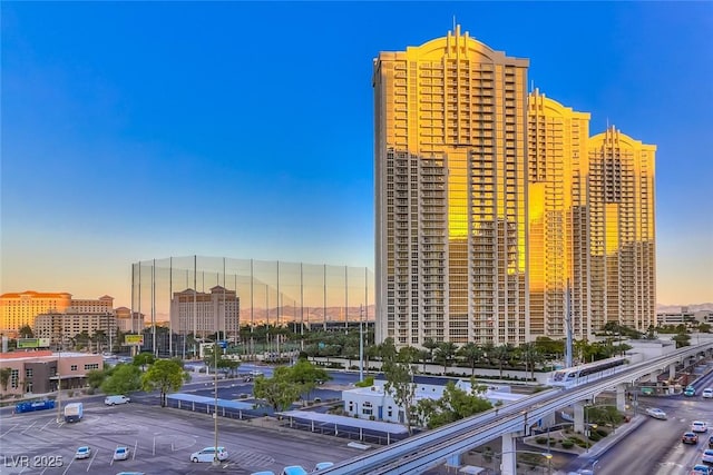 145 E Harmon Ave Unit 1120, Las Vegas, NV 89109 - property at dusk with a view of city